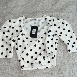 New and Pretty polka dot shoulder puff top